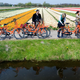 Cyclists visit a Dutch tulip field in Noordwijk, Netherlands.